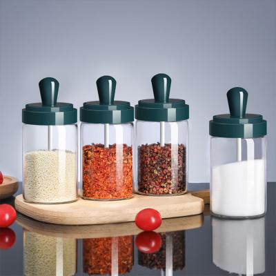 China Base Wood Spice Lid Condiment Container Seasoning Canisters Spoon Glass Sealed Jar for sale