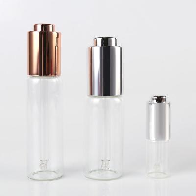 China Cosmetic Glass Bottle Dropper Pump Push Button 20ml Blue Press Type Dropper for sale