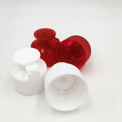 China Non Spill Flip Top Cap Plastic Ribbed 28/410 28/400 HDPE Plastic Bottle Cap for sale