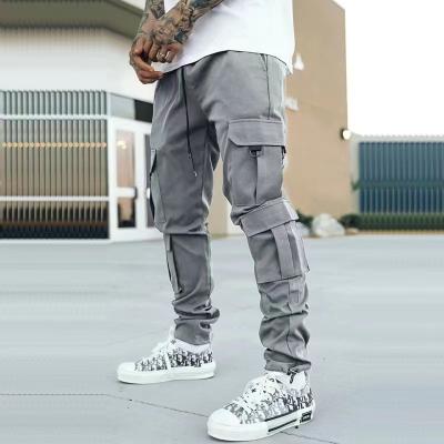 China Custom QUICK DRY Suction Fashionable Casual Loose Twine Premium Pocket Harem Side Pocket Harem Cargo Pants Men 100% Men for sale