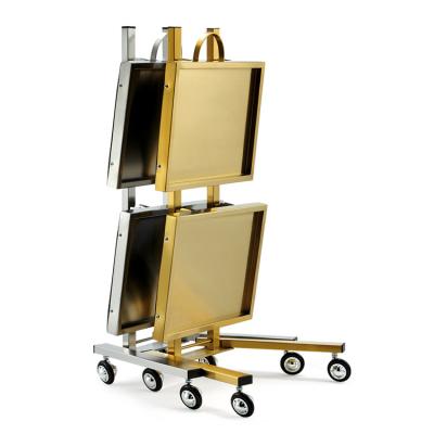 China Gold Stainless Steel Modern Simple Folded Trolley For Salon Hair for sale