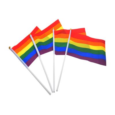 China Various travel agency style high quality Chinese manufacturers hot country hand flag rainbow flag for sale