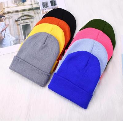 China Wholesale Keeping Warm Winter Keep Warm Knitted Skull Beanie Hat Cap Custom Logo Ski Cap Acrylic for sale