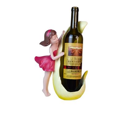 China Small hotel resin sculpture wine rack decoration resin girl wine rack wine rack for sale