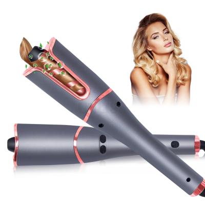 China Ceramic automatic hair curler hair fully curl LCD display ceramic automatic hair curler electric iron for sale