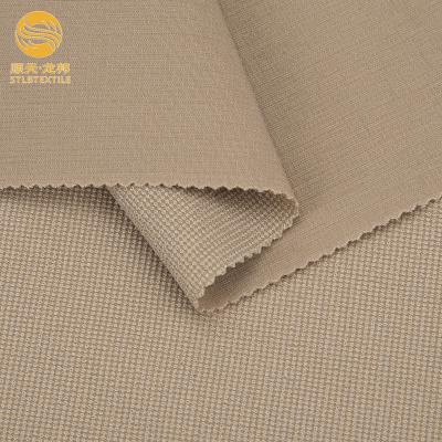 China Shuntian Stretch Customized Color 4 Way Stretch Plain Nylon Spandex Fabric For Tracksuit Sportswear for sale