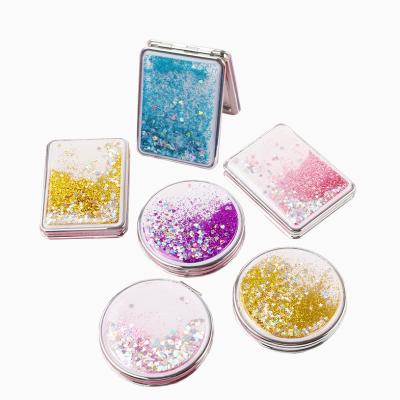 China Double Sided Liquid Floating Quicksand Glitter Makeup Mirror Small Double Sided 3x Magnifying Folding Handheld Mini Portable Travel Design for sale