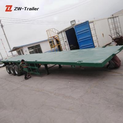 China Goose-Neck Extendable Flatbed Truck Trailer Used Truck Trailer Tri Axle 4 Axle Shipping Container for sale