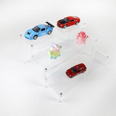 China Display Spring Sign Assemble 3 Tier Clear Acrylic Display Risers Acrylic Display Riser Rack for sale