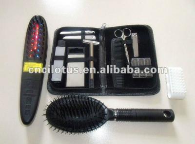 China O poder cresce o dispositivo pessoal do preto da escova de cabelo de Detangling do ABS do pente do laser à venda