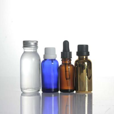 China 10ml 15ml 30ml 100ml Cosmetic Luxury Amber Green Flint Essential Oil Serum Cream Pump Bottle Blue Glass Bottle for sale