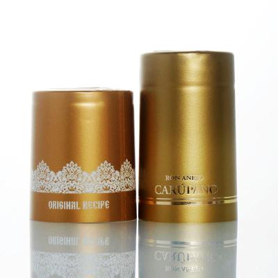 China Wholesale Non-Refillable Custom Embossed Silver Logo PVC Heat Shrink Capsule Gold Wine Easy Tear Cap Easy Tear Cap for sale