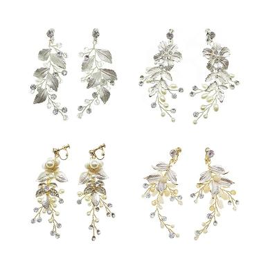 China Fashionable Handmade Rhinestone Crystal Freshwater Pearls Wedding Dangle Earring Clip Style Bridal Earrings for sale