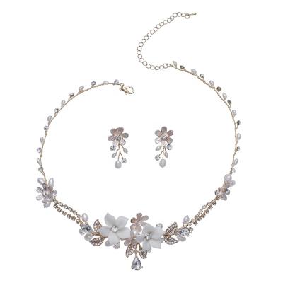 China TRENDY Wedding Dress Jewelry Sets Pearl Freshwater Ceramic Flower Bridal Accessories Necklace Earrings Sets for sale