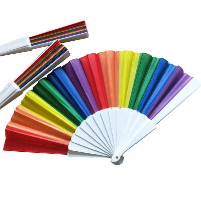 China Custom Plastic Rainbow Folding Hand Fans Fabric Fans China Wedding Decoration Spanish Guest Gift for sale