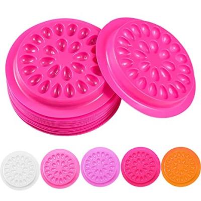 China PVC Multiple Colors Eyelash Extension Glue Holder Paddle Pads Lash Glue Holder Tray Flower Shape False Eyelash Glue Holder for sale