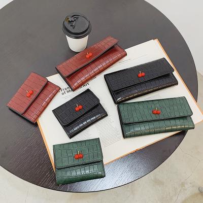 China Anti Theft Customize Soft Fashionable Crocodile PU Women Pinch Cherry Buckle Credit Card Holder Ladies Wallets For Coin Payment Card Slot Wholesale for sale