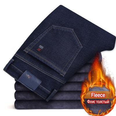 China 2022 New Winter QUICK DRY Men's Jeans Warm Slim Fit Fashion Business Thicken Denim Pants Fleece Stretch Brand Pants Black Blue for sale