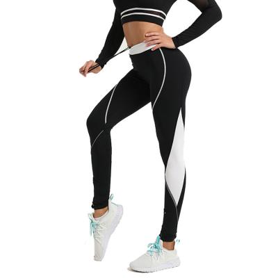 China Breathable Loose Price Yoga Pants Uses Ankle Drawstring Patchwork Running Gaiters With Zipper Pockets for sale