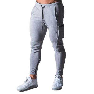 China Casual Cotton Spandex Anti-pilling Multi Pockets Blanket Pants Zipper Bottom Fitness Jegging Pants Mens for sale