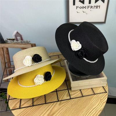 China Accesorios simples superiores planos de Straw Hat With Pearl Flower del borde plano para las mujeres en venta