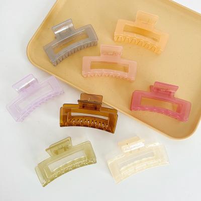 China Transparent Square Hollow Jelly Color Plastic Hair Claw For Women en venta