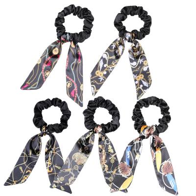 China Wrinkle Bow streamer scrunchies printing hair accessories en venta