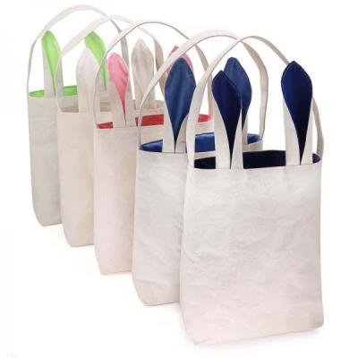 China Bolsos de las decoraciones de la bolsa de asas de las compras del yute de la cesta de la lona del conejo de conejito de pascua de los niños con en venta