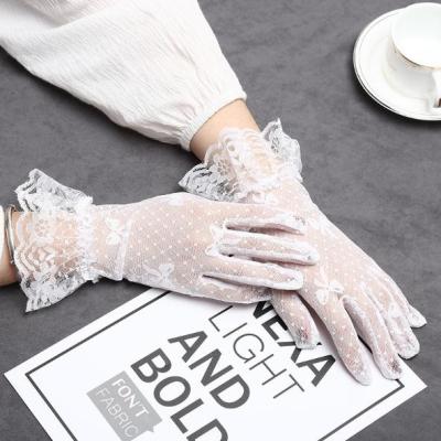 China Wrist Length Lace Bride Gloves Outdoors Sun Protection Gloves Elegant Lace Gloves for sale