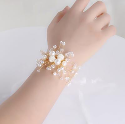 China New fashion daily life artificial flowers band hand bridal flower and wedding wrist flowers for sale