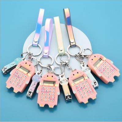 China Arts and Crafts New Cute Cartoon Mini Calculator Student Nail Scissors Key Chain Creative Pendant Key Chain for sale