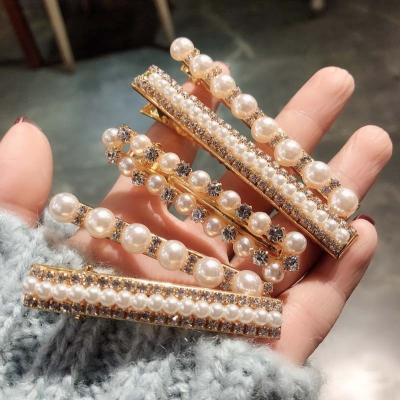 China ZooYing 2019 Newest Summer Popular Pearl Gold Color Crystal Hair Clip For Women for sale