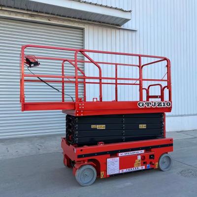 China Mobile hotels scissor lift maintenance lift locomotive can walk and lift remote control platform car for sale