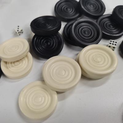 China Environmental factory selling high quality plastic circle checkers wholesale yellow and black backgammon chess china made for sale