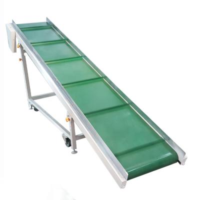 China Heat Resistant Customize New Green PVC Belt With Vertical Climbing Baffle Food Grade Conveyor Belt With Hopper for sale