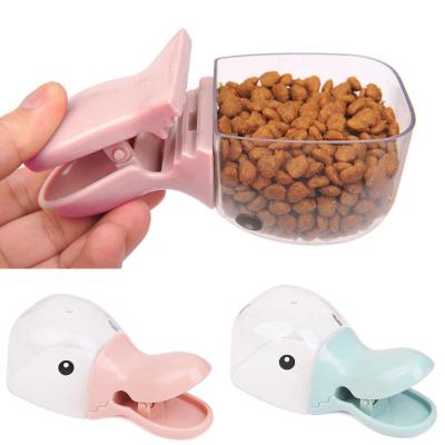 China 2019 New Design Plastic Universal Cute Cartoon Pet Food Scoop Sustainable for sale