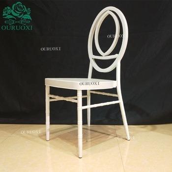 China Simple Design Modern White Iron Metal Round Hollow Backrest Stacking Wedding Banquet Chairs for sale