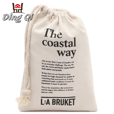 China Fashionable High Quality Large Reusable White Canvas Drawstring Bag With Logo for sale