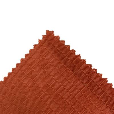 China Flame Retardant Flame Retardant Water Repellent Fabric Aramid Blend Woven Fabric Nomex Fabric Orange For Firefighter Suits for sale