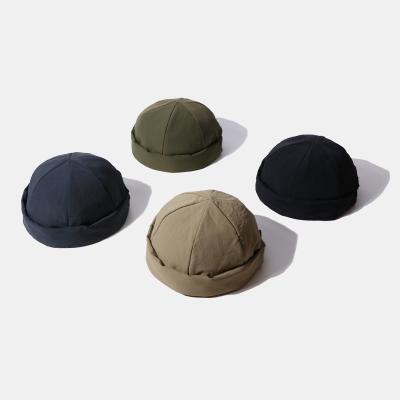 China Free Sample Winter Retro Street Warm Wholesale Cotton Couple Simple Skullcap Brimless Docker Sailor Hat for sale