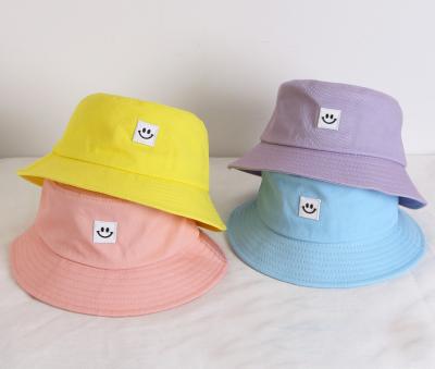 China Free Shipping Wholesale Custom Character Logo Plain Smile Face Cap Summer Sun Beach Prevent Bucket Hat For Women Men for sale