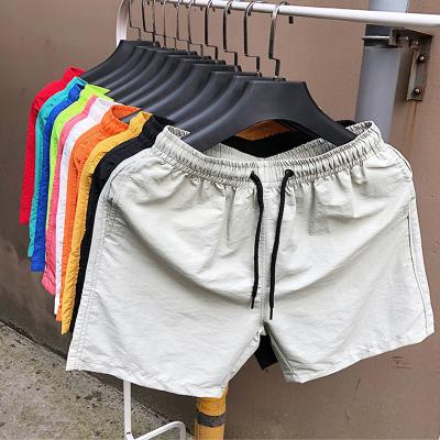 China Wholesale Custom Anti-Wrinkle Summer Beach Wear Man Polyester Shorts Sports Gym Fitness Running Shorts Pants for sale