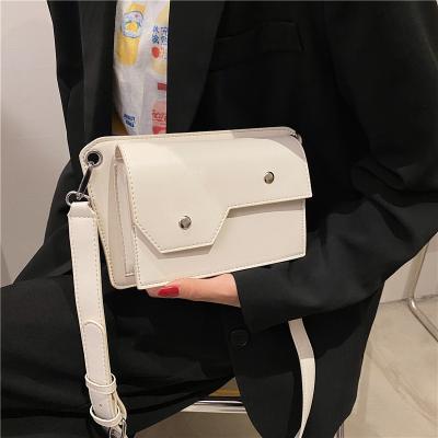 China 2021 New Fashion Fashion Pure Color Straddle Handbags Shoulder Messenger Bag Small Square Wide Band Single Bag for sale