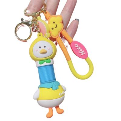 China Cute Style Cartoon Cute Retractable Duck Pendant Creative Couple Exquisite Schoolbag Key Chain Car Keychain Ornaments Small Gift for sale