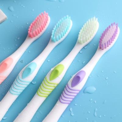 China New Whole Clean Mouth Household Massage Handle Adult Toothbrush With Tongue Cleaner for sale