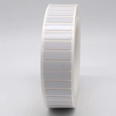 China 23.5mmx7mm Etiqueta adhesiva permanente 1.5mil Etiqueta de poliamida blanca mate resistente a altas temperaturas en venta