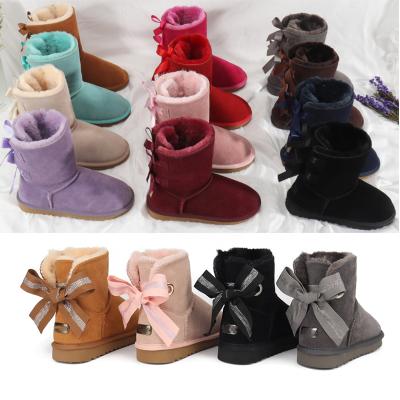 China 2021 Fashion Winter Wholesale Women Snow Boots Ankle Women Shoes Bow Lady Designer Luxury Uggly Short Girls Down Bows Boots For Women for sale