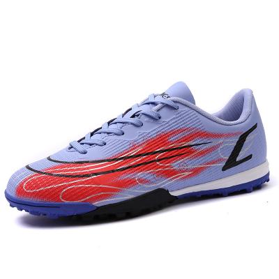 China Rubber Mandarin duck football shoes men's non-slip low-top sports shoes women multi-color for sale