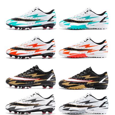 China Anti-slip New football shoes AG long nail men anti-slip wear indoor artificial grass shoes for sale