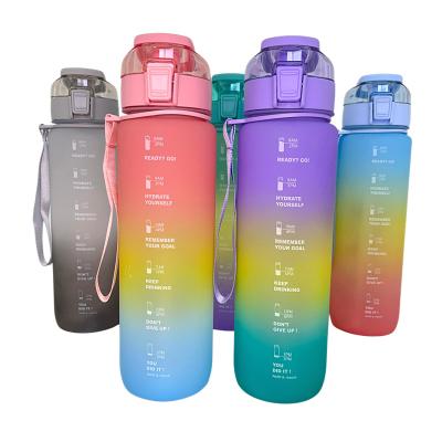 China New Arrival Stocked 1l 32oz Frosted Blue Gradient Shaker Plastic Water Bottles With Stickers Time Marker Running for sale